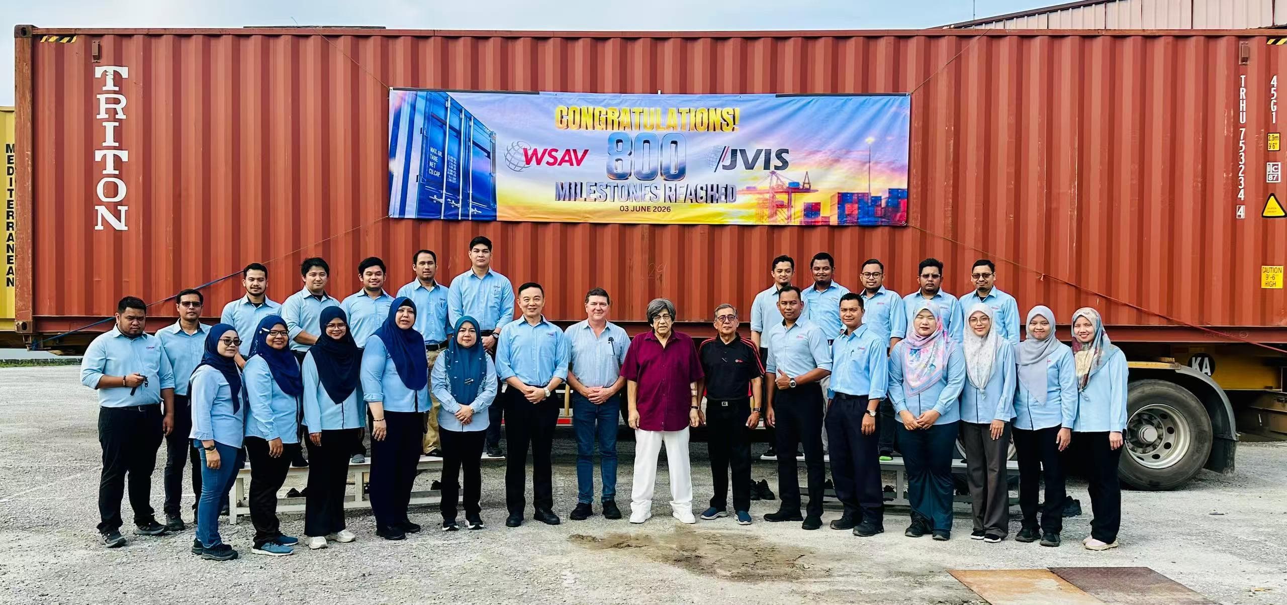 WXPE team at manufacturing facility in Malaysia