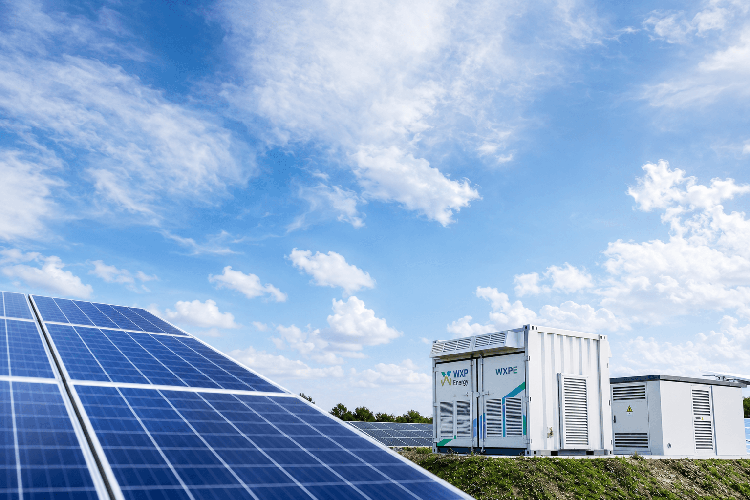 WXPE-branded battery energy storage beside solar panels